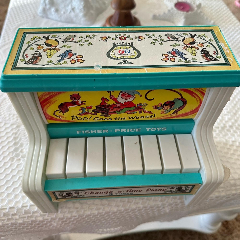 Fisher-Price Nursery Rhyme Board with Blue and Yellow Accents